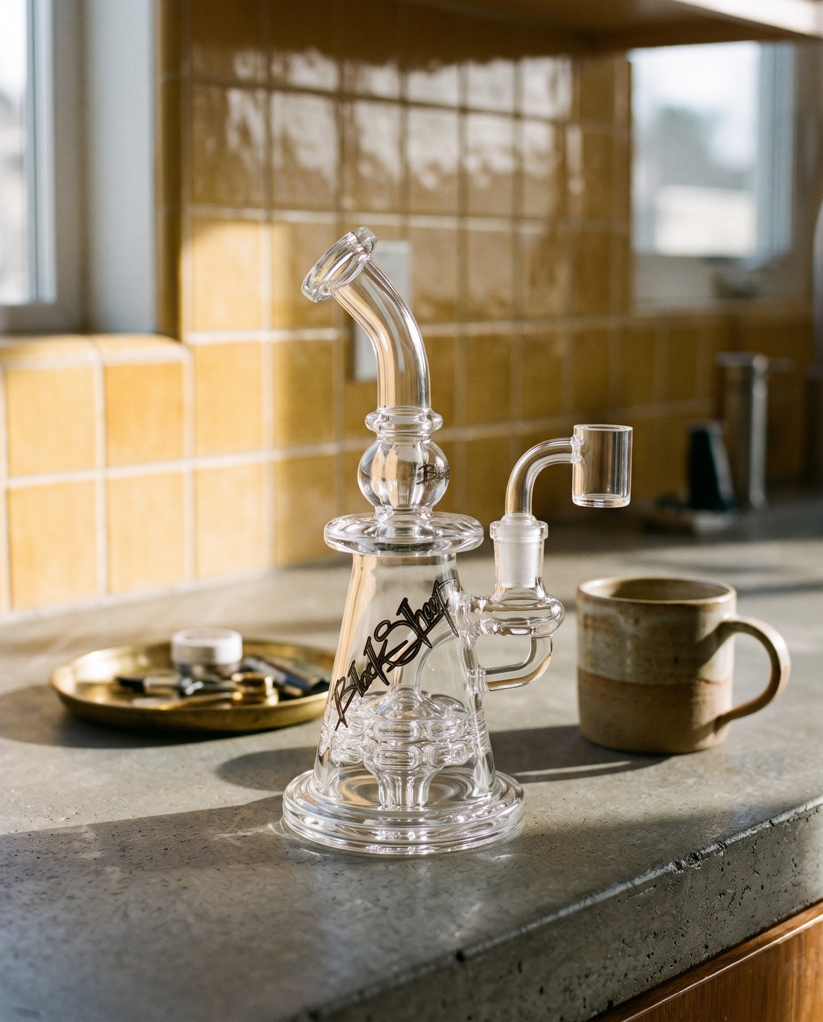 Black Sheep Gallery windmill ratchet glass rig on a concrete kitchen counter